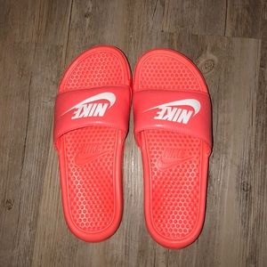 neon orange nike slides